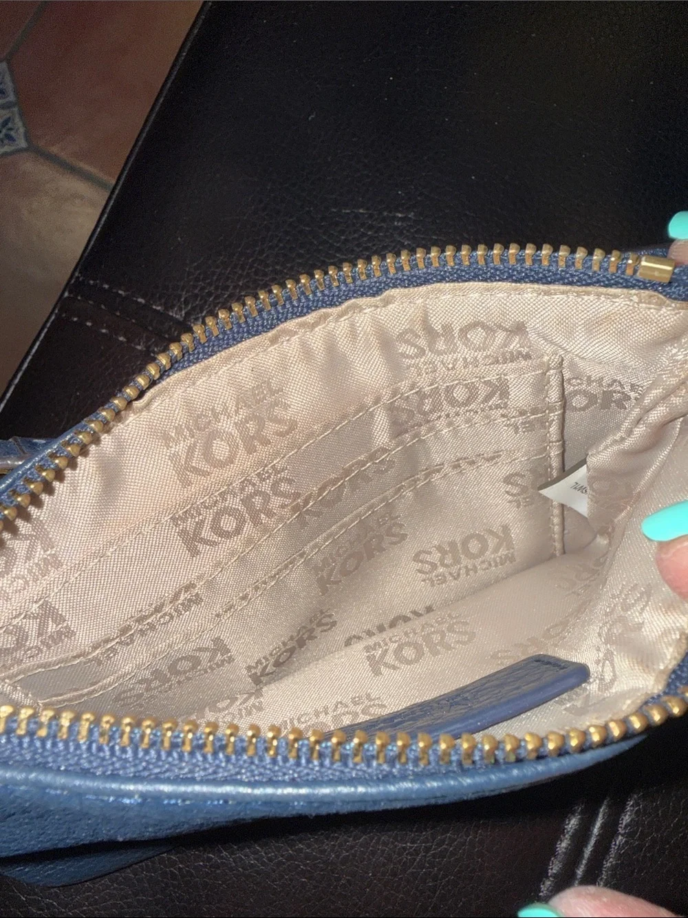 Michael Kors Blue Pebbled Leather Wristlet with Gold Plate